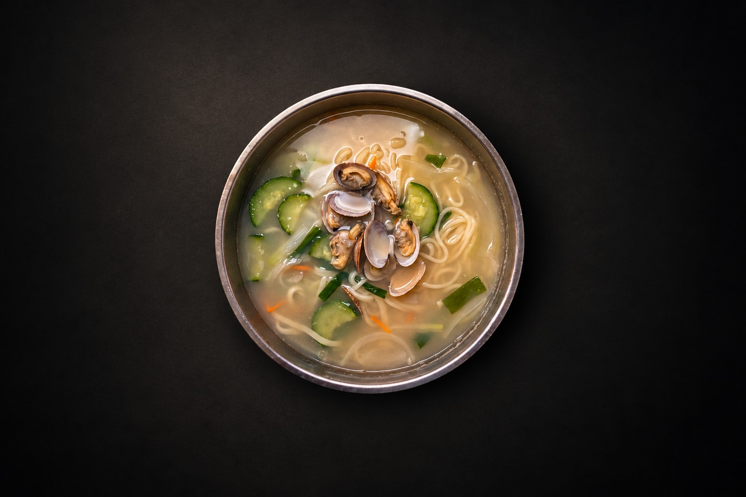 A light broth with sliced vegetables